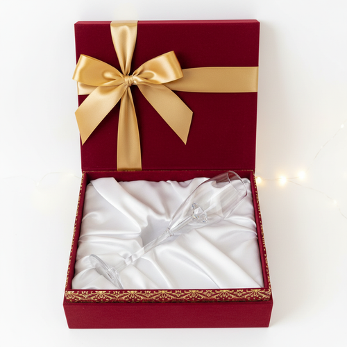 Check the glasses we sell on our website, choose one and then make a picture that show an open gift box with a bow on the top of the box and that one glass you chose from our website, inside the box.